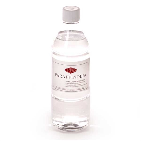 Flaska med parafinolja som är bra till onoljning av skärbrädor mm. som man vill ska vara luktfria.